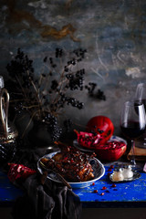 quail in pomegranate sauce. rustic photo