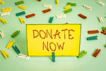 Word writing text Donate Now. Business photo showcasing to give something like money or goods to a...