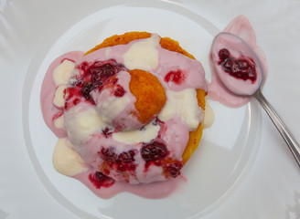 romanian cheese donuts with yoghurt and raspberry jam and sour cream