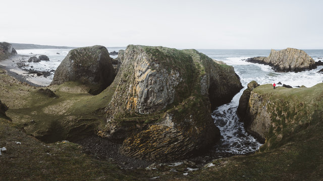 Big stones in the ocean seaside in stormy environment in Ballintoy