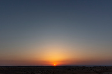 Sunset over the desert, disappearing sky, perspective, uncluttered, nature, empty
