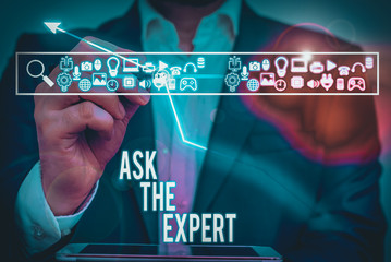 Writing note showing Ask The Expert. Business concept for Looking for professional advice Request Help Support