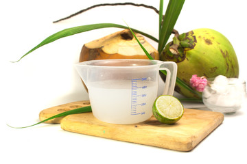Coconut juice,Drink coconut water on white background