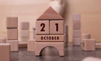 Obraz na płótnie Canvas October 21 written with wooden blocks