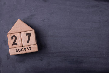 August 27 written with wooden blocks