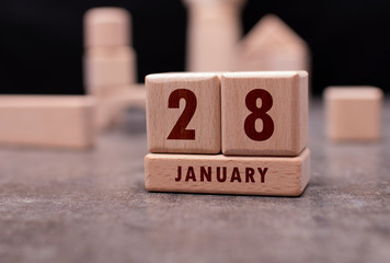 January 28 written with wooden blocks