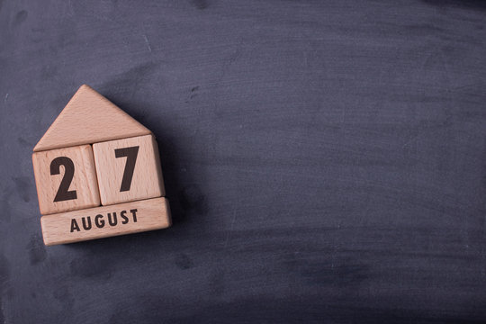 August 27 written with wooden blocks