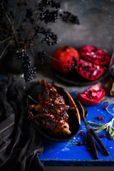 Fototapeta na wymiar quail in pomegranate sauce. rustic photo