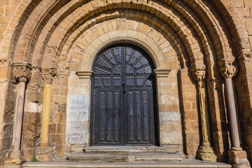 Fototapeta na wymiar Close up on a portal of Santa Juliana Church and monastery in Santillana del Mar town, Spain