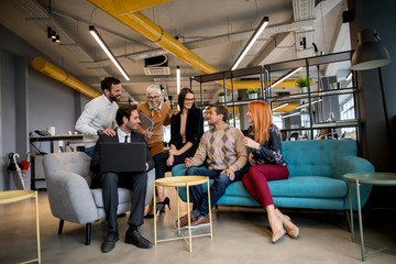 Group of young business people are working together with laptop