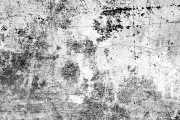 Texture of a concrete wall with cracks and scratches which can be used as a background