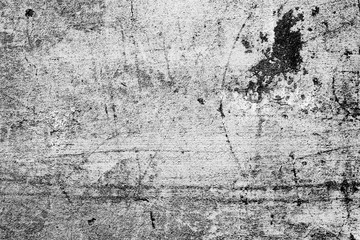 Texture of a concrete wall with cracks and scratches which can be used as a background