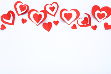 Red paper hearts isolated on white background