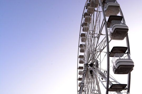 The big ferris wheel and roller coaster in Barry Island Pleasure Park, Barry South Wales