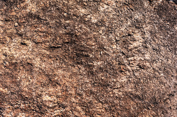 surface of the stone mountain texture and background with brown tint