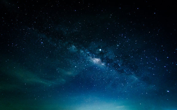 Milky way galaxy with stars and space in the universe background at thailand