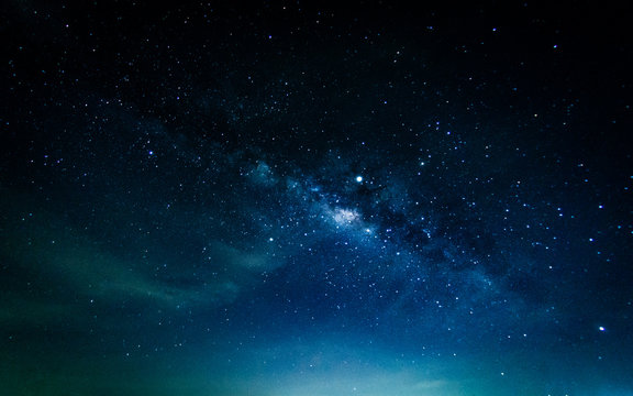 Milky way galaxy with stars and space in the universe background at thailand