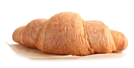 Tasty fresh crispy croissant isolated on white