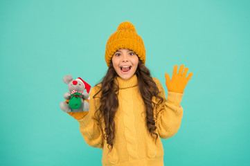 mouse symbol of the year. cute little girl hold mouse toy. child knitted warm outfit play with toy rat. toy shop for kids. buy christmas presents. being in xmas mood. happy new 2020 year