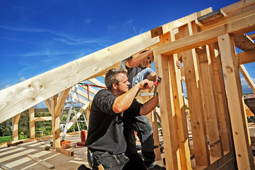 Carpenters Setting up a Half-timbered Building and the Roof Structure