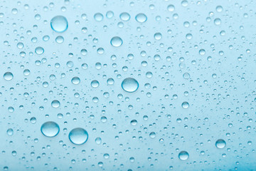 Water drops on blue background