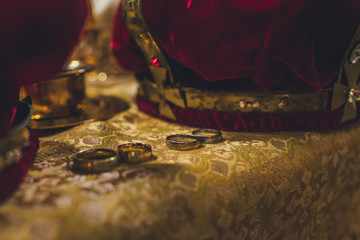 Church ordinance orthodox and wedding, church wedding, religious of a child in church, icons, Orthodox church, candles, interior of the Orthodox Church, bible, font