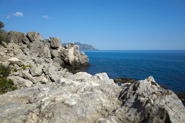 Fototapeta na wymiar The rocky coast of the Black Sea. Cape Alchak in Sudak, Crimea