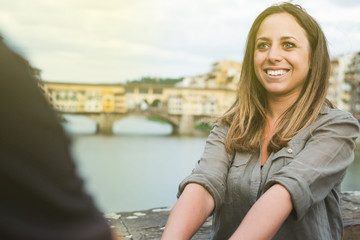 Young Couple In Front of Ponte Vecchio. Florence