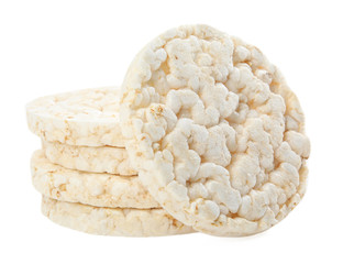 Stack of puffed rice cakes isolated on white