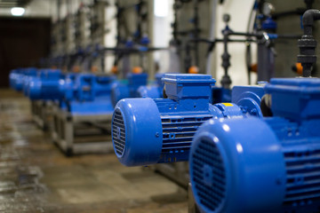 The engine room at the treatment facilities .Equipment inside the industrial premises .