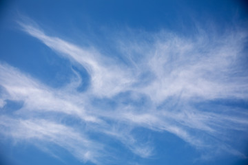 background blue sky with white cirrus clouds