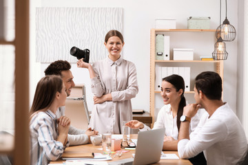 Team of professional journalists working in office - obrazy, fototapety, plakaty