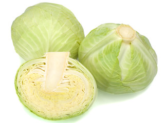 Two cabbage and a half isolated on white background
