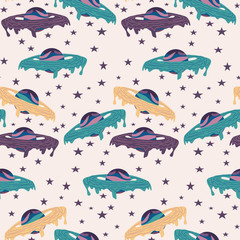 seamless pattern design with yellow, green and purple galactic planets