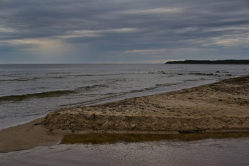 Landscape in cloudy weather at sea