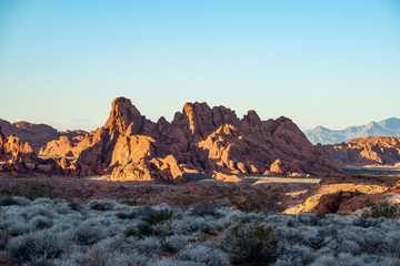 USA, Nevada, Clark County, Valley of Fire. Red sandstone rock formations beyond the White Domes Trail.