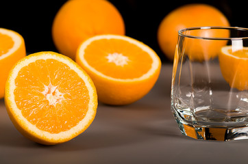 Fresh orange juice. Orange juice in a beautiful glass. Juicy orange.