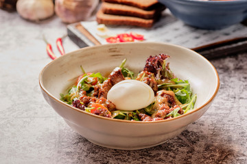 Leaf salad with poached egg and red meat. Dinner Idea. A healthy, delicious brunch.