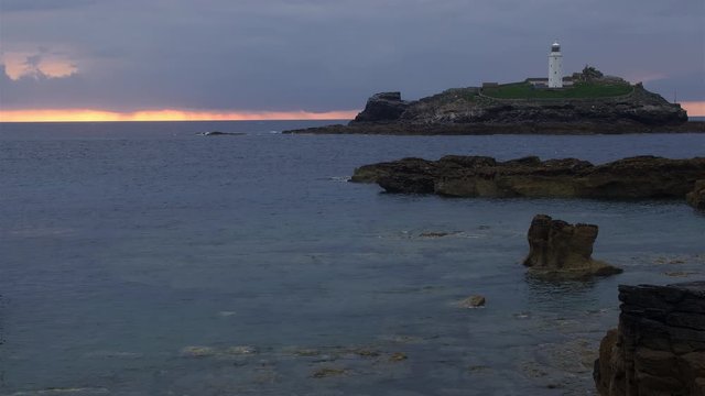 Godrevy Lighthouse, St. Ives Bay, Cornwall - The Beautiful Attraction Of A Famous Landmark Captured At Sunset - Wide Shot