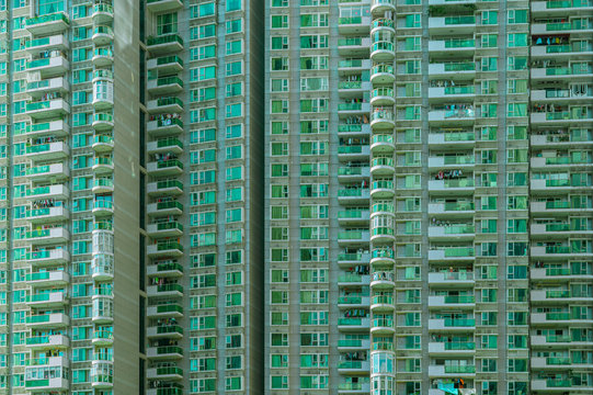 Shenzhen - green appartment block in megacity at daylight