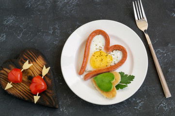sausages and tomatoes in the shape of a heart for Valentine's day