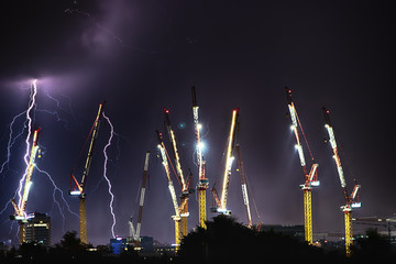 Lightning storm over construction site
