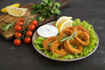 squid rings deep fried with crispy crust.