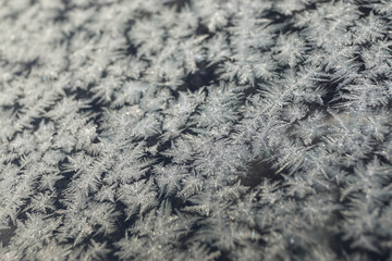  snowflakes and ice on glass