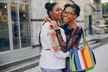 Girls on the street. Beautiful girls. Girls walk along the streets of the city