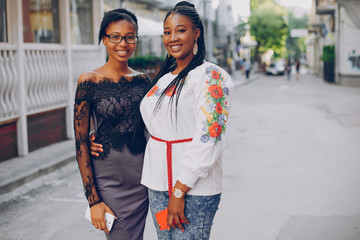 Girls on the street. Beautiful girls. Girls walk along the streets of the city