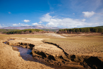 The bottom of the empty Studena dam near Pernik, Bulgaria. Hot weather and climate changes makes the dam almost empty. November 2019. Climate disaster.