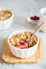 Cherry and Apricot crumble pie. Fruit Crumble with Any Kind of Fruit. Dessert with fruits, oatmeal and almonds. Berry cake, crisp in baking dish. Crispy cake