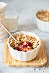 Cherry and Apricot crumble pie. Fruit Crumble with Any Kind of Fruit. Dessert with fruits, oatmeal and almonds. Berry cake, crisp in baking dish. Crispy cake