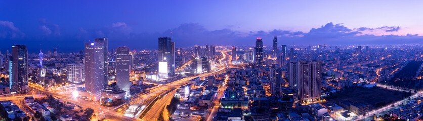 Fototapeta na wymiar Aerial View Of Tel Aviv Skyline At Dusk, Tel Aviv Cityscape Panorama At Sunrise, Israel